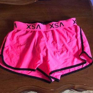VSX hot pink running shorts